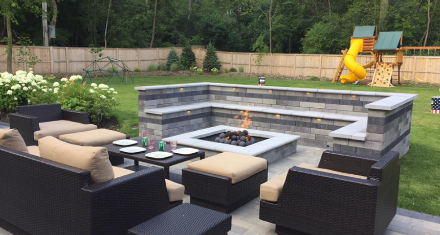 Fire Pit and patio constructed by Pavestone Brick Paving