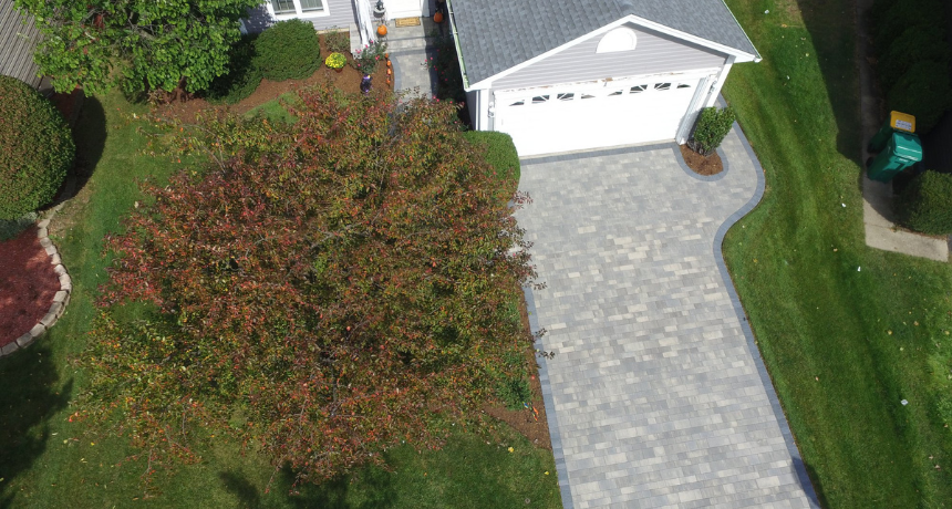 professional brick paver driveway by Pavestone Brick Paving